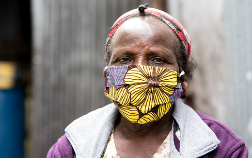 Kenyan person wearing mask.